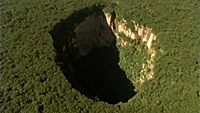 Sarisarinama sink hole, aerial  film clip