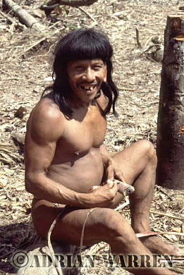 AW_Waorani64, Waorani Indians : Caempaede making Blowgun, rio Cononaco, Ecuador, 1983