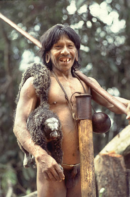 AW_Waorani49, Waorani Indians : Caempaede returning from hunt with Saki Monkey, 1983