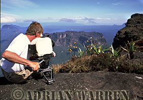 Adrian Warren filming from summit of Roraima